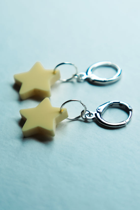 pair of yellow pastel star earrings
