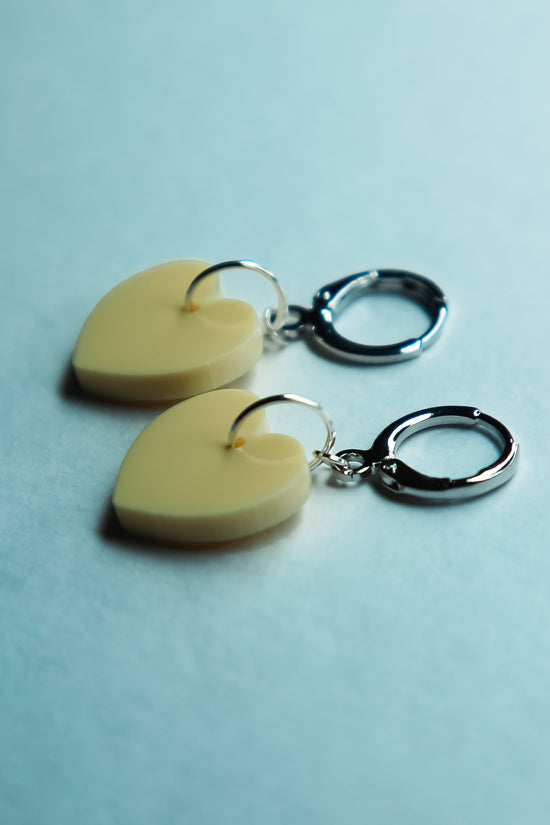 pair of yellow pastel heart earrings